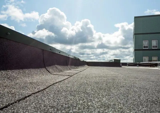 Why Flat Roofs Pond — and What to Do About It — Step by Step